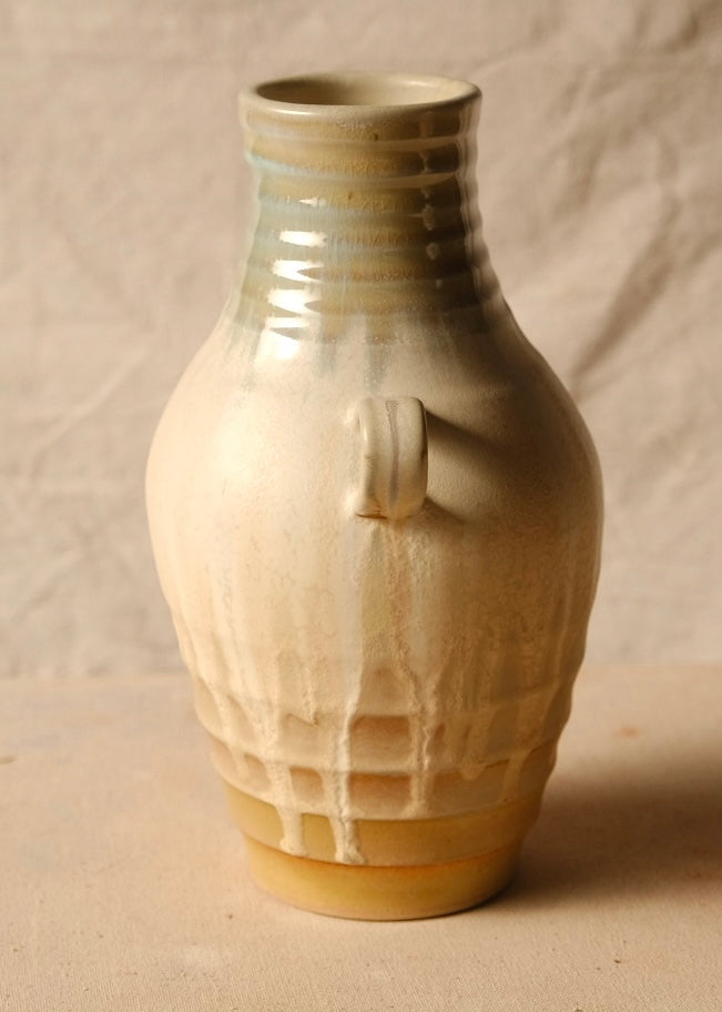 Woodfire Amphora # 4 side view highlighting dripping glaze trails across the fluted lower section.