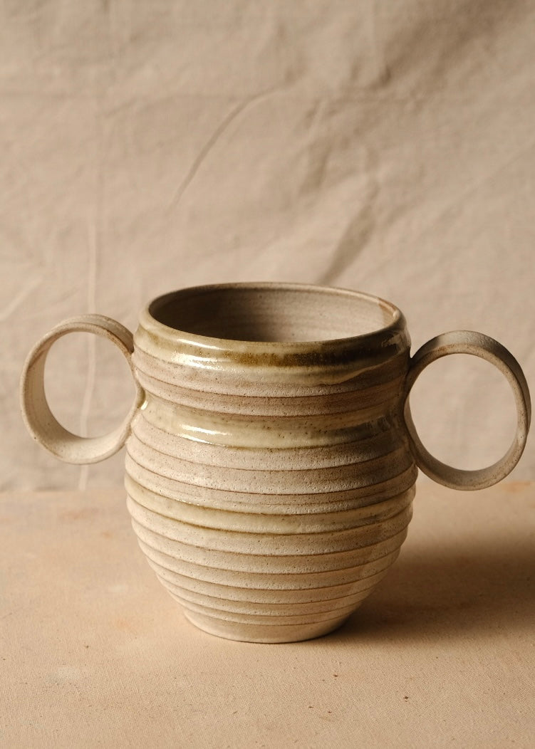 OO Amphora reverse face with both circular handles visible, showing an even glazed collar and grooved base.
