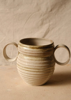 OO Amphora reverse face with both circular handles visible, showing an even glazed collar and grooved base.