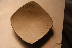 Mesa Platter with heavily speckled satin finish, top-down view showing soft square-round contour.