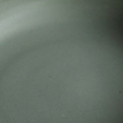 Smooth satin-matte sage grey glaze with an even surface and subtle tone variation by Settle Ceramics.