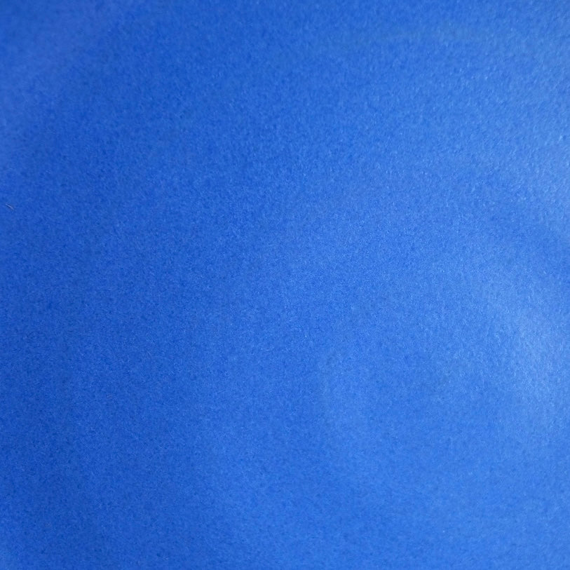 Fat Rim Dinner Plate glaze swatch, close-up texture of smooth, solid blue satin finish.