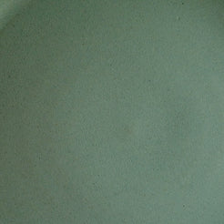 Muted seafoam green ceramic glaze with a smooth matte finish and delicate micro-texture by Settle Ceramics.