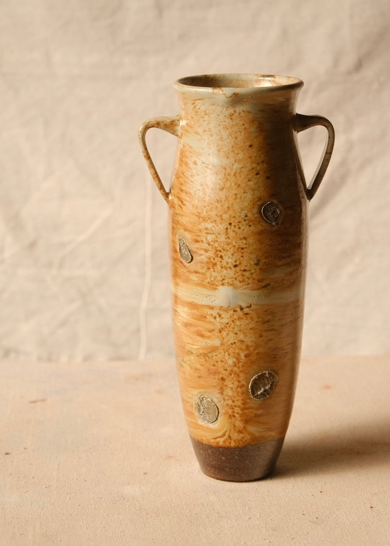 Woodfire Amphora #6, front view showing wadding marks, two loop handles, flared rim, and dark tapered foot.