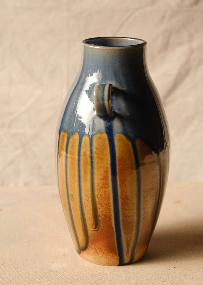 Woodfire Amphora #9, opposite side view focused on a single handle with clean vertical drip lines to the foot.