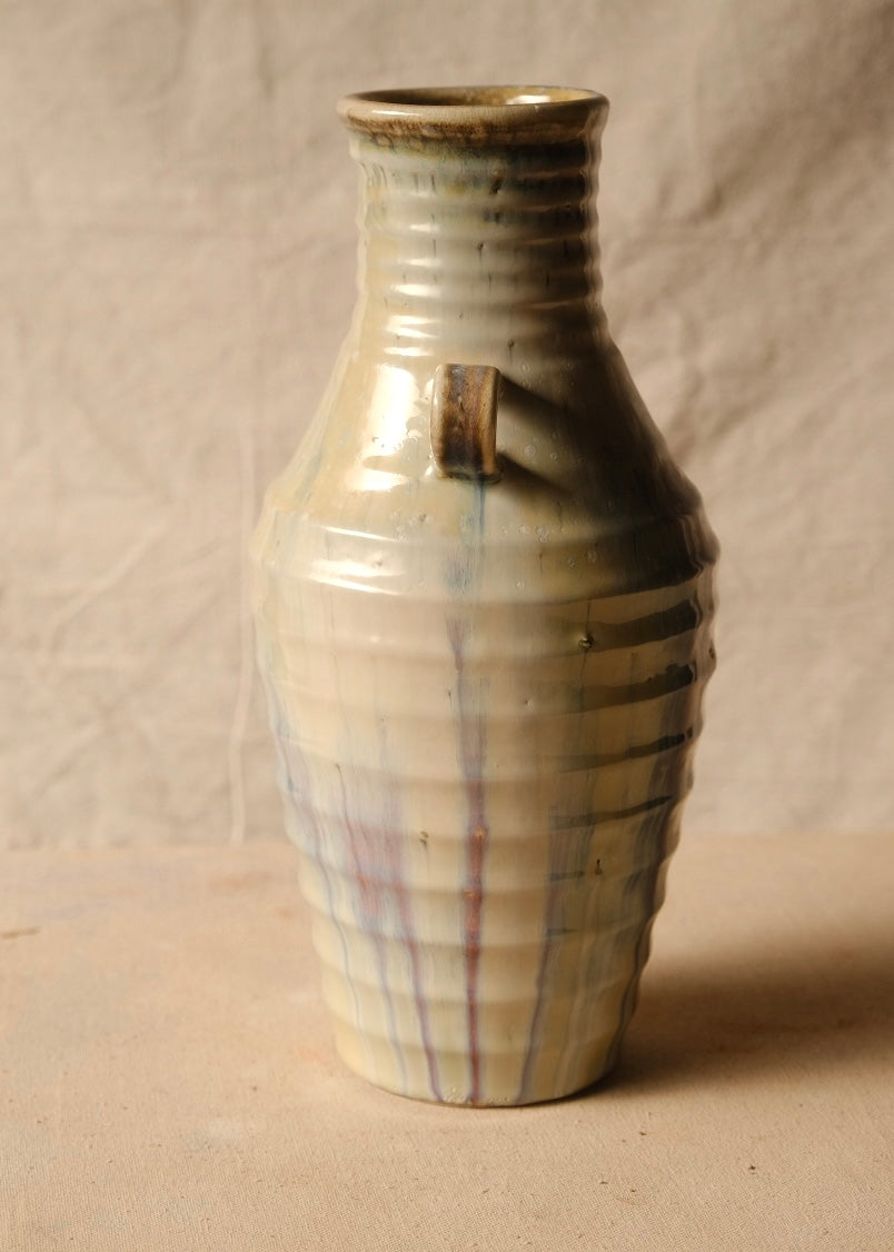 Woodfire Amphora #3 rotated to profile with a single handle visible centered, highlighting horizontal throwing ridges.